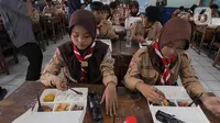 Diketahui, program makan bergizi gratis merupakan salah satu program yang dijanjikan Presiden dan Wakil Presiden Prabowo Subianto-Gibran Rakabuming Raka saat berkampanye. (Liputan6.com/Herman Zakharia)