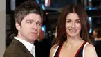 Musisi Inggris Noel Gallagher (kiri) dan istrinya Sara MacDonald berpose saat mereka tiba di karpet merah BAFTA British Academy Film Awards di Royal Opera House, London, Inggris, 8 Februari 2015. “Noel dan Sara akan terus menjaga anak mereka bersama-sama, dan ini tetap menjadi prioritas mereka,” kata sang juru bicara. (AFP PHOTO/JUSTIN TALLIS)