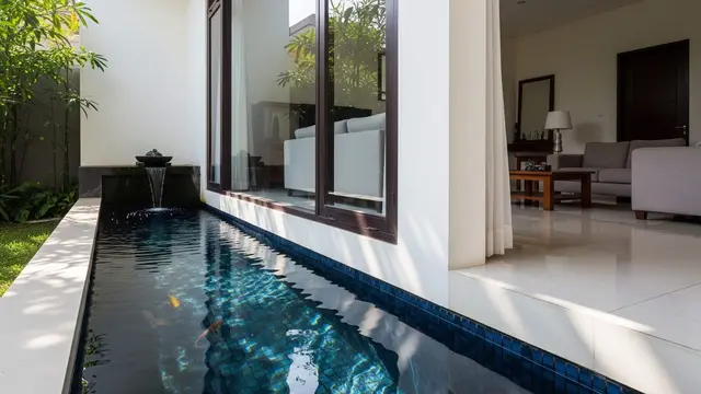 Desain Kolam Ikan Bawah Jendela Ruang Tamu yang Estetik dan Hemat Tempat