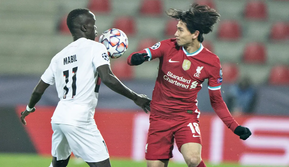 Takumi Minamino. Pemain terakhir Liverpool yang mengenakan jersey bernomor punggung 18 yang akhirnya menjadi milik Cody Gakpo adalah Takumi Minamino. Sayap kiri Jepang berusia 27 tahun tersebut baru saja hengkang ke AS Monaco pada awal musim 2022/2023 setelah 2,5 musim membela Liverpool sejak pertengahan 2019/2020. Bersama Liverpool Takumi Minamino yang sempat pula dipinjamkan ke Southampton selama setengah musim pada pertengahan 2020/2021 ini total bermain dalam 55 laga di semua ajang bareng The Reds dengan torehan 14 gol dan 3 assist. (AFP/Ritzau Scanpix/Henning Bagger)