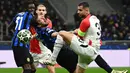 Bermain di hadapan publik sendiri, Inter Milan sukses membekuk Feyenoord dengan skor 2-1. (Isabella BONOTTO/AFP)