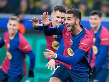 Barcelona berjuang keras untuk mendapat hasil maksimal di kandang Borussia Dortmund pada matchdy enam Liga Champions di Stadion Signal Iduna Park, Dortmund, Kamis (12/12/2024). (AP Photo/Martin Meissner)