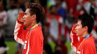 Ganda campuran Indonesia, Tontowi Ahmad/Liliyana Natsir, meraih medali emas pada Olimpaide Rio 2016. (Reuters/Mike Blake)