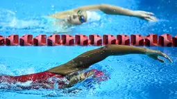 Kamonchanok Kwanmuang (bawah) dari Thailand bertanding dalam final kelas 400 m medley putri SEA Games ke-32 di Phnom Penh, Kamboja, 9 Mei 2023. (Photo by MOHD RASFAN / AFP)