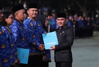 9.051 tenaga honorer Pemerintah Kabupaten Bekasi resmi dilantik sebagai Pegawai Pemerintah dengan Perjanjian Kerja (PPPK) oleh Bupati Bekasi, Ade Kuswara Kunang. (Istimewa)