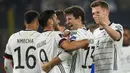 Jerman sukses meraih tiga poin dalam laga lanjutan Grup J Kualifikasi Piala Dunia 2022 melawan Liechtenstein. Tak tanggung-tanggung, skuat Der Panzer berpesta sembilan gol tanpa balas pada pertandingan yang berlangsung di Volkswagen Arena, Jumat (12/11/2021) dini hari WIB tersebut. (AP/Michael Sohn)