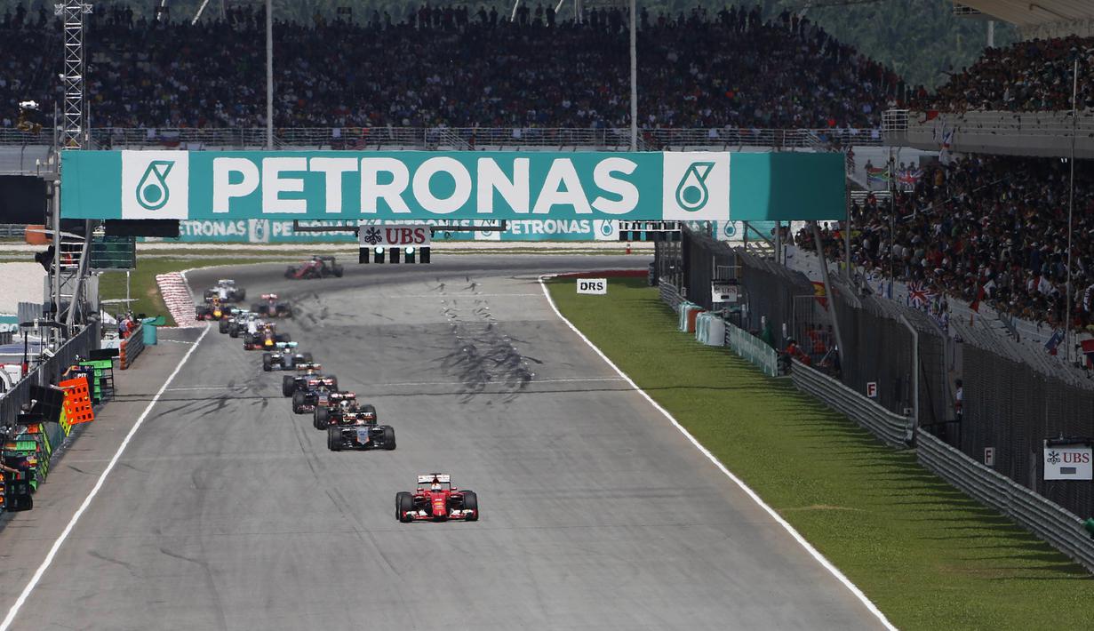 Sebastian Vettel mulai menunjukkan tajinya dengan memimpin perlombaan (Reuters / Olivia Harris)