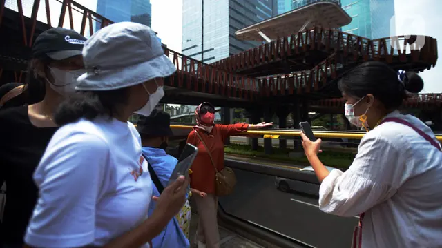FOTO: Wisata Keliling Ibu Kota Naik Bus Tingkat Transjakarta