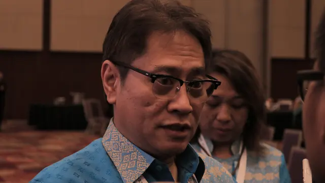 Dirjen Perundingan Perdagangan Internasional di Kementrian Perdaganga RI, Iman Pambagyo Memberi Keterangan Usai Penandatangan Terms of Reference (TOR) untuk Trade Review RI-Inggris di ICE BSD pada Rabu (16/10/2019) (Liputan6.com/Hugo Dimas)