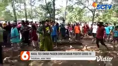 Ratusan orang mendatangi pemakaman pasien positif Covid-19, di Desa Rowogempol, Kecamatan Lekok, Pasuruan, Kamis sore. Massa merebut peti jenazah dan mengeluarkan paksa jenazah, hingga petugas pemakaman yang mengenakan APD lengkap hanya bisa terdiam.