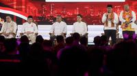 Pasangan calon gubernur dan wakil gubernur DKI Jakarta nomor urut 3, Pramono Anung-Rano Karno saat menyampaikan visi misi dalam segmen pertama pada debat perdana calon gubernur dan wakil gubernur DKI Jakarta di JIExpo, Kemayoran, Jakarta Pusat, Minggu (6/10/2024). (Liputan6.com/Herman Zakharia)