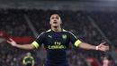 Alexis Sanchez merayakan golnya ke gawang Soton pada laga Premier League di St Mary's stadium, Southampton, (10/5/2017). Arsenal menang 2-0. (Nick Potts/PA via AP)