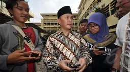 Sabran membantah laporan ke polisi adalah perintah orang lain atau balas dendam setelah Komjen Budi Gunawan ditetapkan sebagai tersangka oleh KPK, Jakarta, Jumat (23/1/2015). (Liputan6.com/Miftahul Hayat)