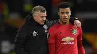 Pelatih Manchester United, Ole Gunnar Solskjaer, percaya jika Mason Greenwood bisa menyamai kehebatan Wayne Rooney sebagai pemain di masa mendatang. (AFP/