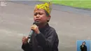 Kehadiran Farel Prayoga di Istana Negara membuat perayaan HUT ke-77 RI semakin meriah. Terlebih ia membawakan lagu yang membuat namanya menjadi viral, Ojo Dibandingke. (Tangkapan layar YouTube Sekretariat Presiden)