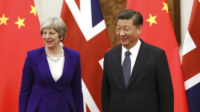 PM Inggris Theresa May dan Presiden China Xi Jinping Membahas Isu Perdagangan Bebas - AFP