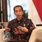 Presiden Joko Widodo saat  wawancara khusus dengan SCTV di Long Room Istana, Jakarta, Rabu (20/7). Presiden menjelaskan berbagai macam keuntungan dari Tax Amnesty. (Liputan6.com/Faizal Fanani)
