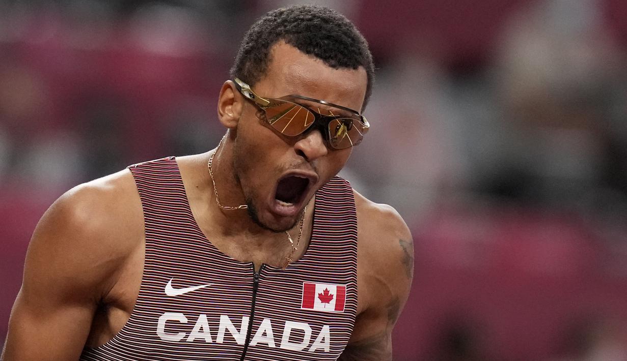 Pensiunnya Usain Bolt di cabang olahraga lari seolah menjadi angin segar bagi sprinter lain, termasuk Andre De Grasse. Benar saja, pelari asal Kanada langsung tunjukkan tajinya di nomor 200 meter putra Olimpiade Tokyo 2020. (Foto: AP/Markus Schreiber)