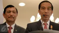 Presiden Jokowi saat memberikan pidato di Bandara Halim Perdanakusuma, Jakarta Timur, Rabu (2/12). (Liputan6.com/Faizal Fanani)
