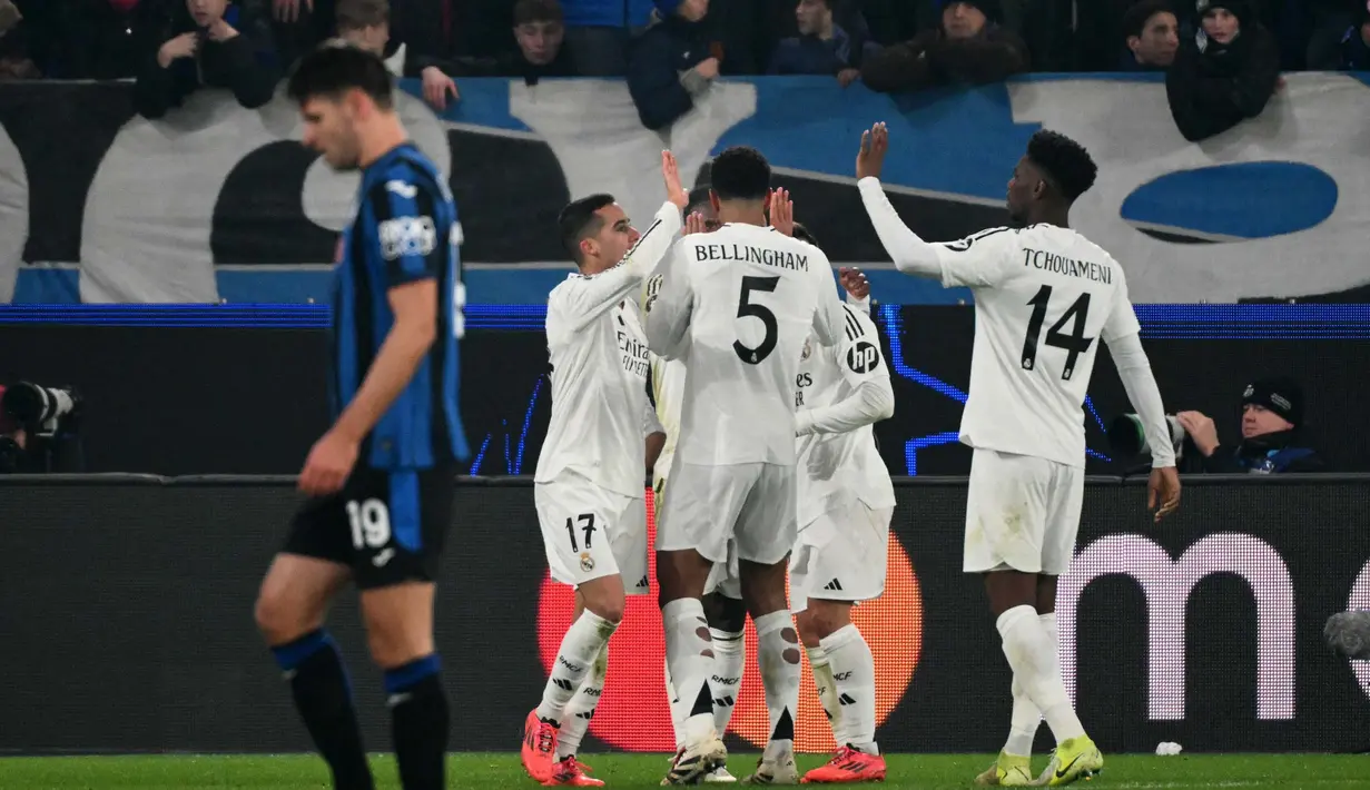 Bermain di Stadion Gewiss, Los Blancos berhasil mengemas poin penuh usai mengalahkan tuan rumah Atalanta dengan skor 3-2. (Alberto PIZZOLI/AFP)