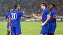 Pemain Chelsea merayakan gol yang dicetak Joao Pedro (20) ke gawang AC Milan dalam laga pramusim di Stadion Utama Gelora Bung Karno (SUGBK), Jakarta, Sabtu (8/8/2026). Gol tersebut menjadi pembuka pesta kemenangan The Blues sebelum akhirnya menutup pertandingan dengan skor 3-0 atas Rossoneri. Joao Pedro mencetak dua gol, sementara satu gol lainnya disumbangkan Moises Caicedo. (KapanLagi.com/Budy Santoso)