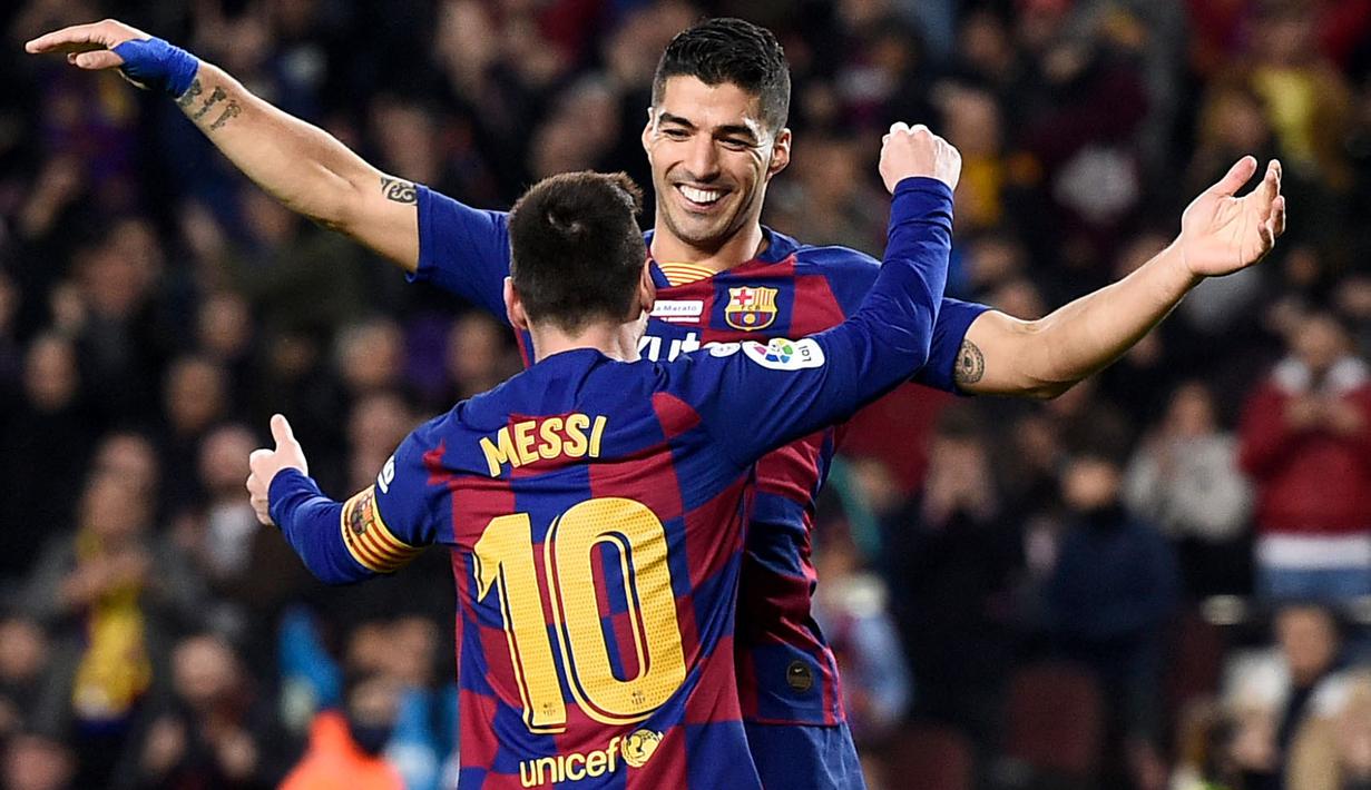 Pemain yang paling sering mendapatkan umpan dari Lionel Messi adalah Luis Suarez. Bersama Neymar, mereka menjadi trio paling menakutkan dalam dunia sepak bola. Tercatat 39 dari 198 golnya di Barcelona merupakan umpan dari La Pulga. (AFP/Josep Lago)