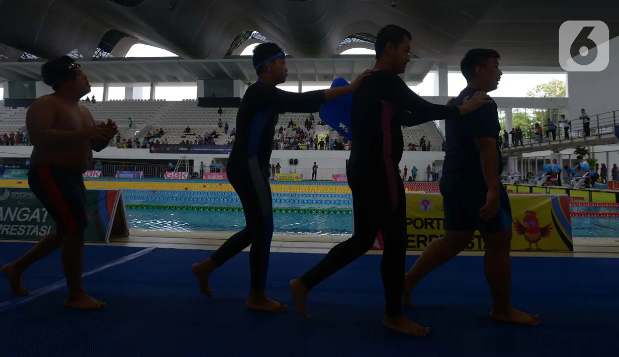 Atlet para swimming mengikuti kejuaaran 2nd Jakarta Open Para Swimming Championship 2019 di GBK Aquatic Center, Jakarta, Sabtu (29/11/2019). Kejuaran renang yang diikuti para atlet disabilitas ini dapat menumbuhkan atlet disabilitas yang unggul dan bisa mewakili Indonesia. (merdeka.com/Imam Buhori)