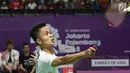 Tunggal putra Indonesia, Anthony Sinisuka Ginting saat melawan pemain China, Shi Yuqi pada final Bulutangkis Beregu Putra Asian Games 2018 di Jakarta, Rabu (22/8). Anthony Sinisuka Ginting  menyerah 21-14, 21-23, 20-22 (Liputan6.com/Helmi Fithriansyah)