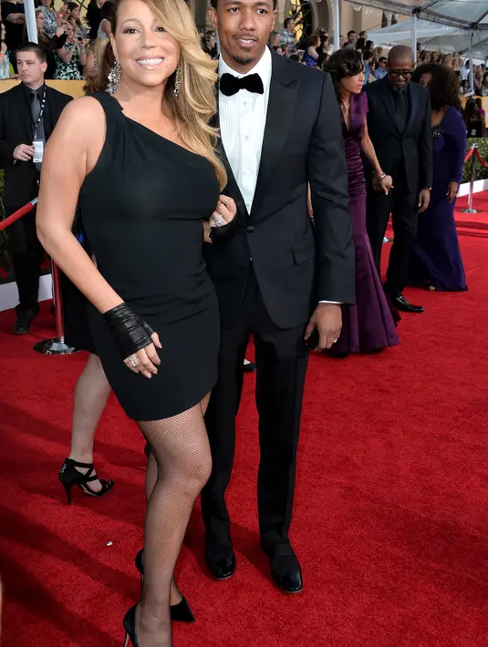Mariah Carey dan Nick Cannon. Perbedaan usia: 11 tahun. “Usia bukanlah apa-apa namun hanya angka,” ujar Nick ketika ditanyakan oleh Oprah. Namun mereka memilih bercerai pada tahun ini. (AFP/Bintang.com)