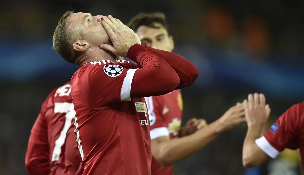 Wayne Rooney yang telah pensiun pada Januari 2021 bersama Derby County hingga kini masih tercatat sebagai pemain Inggris tertajam di Liga Champions dengan mengoleksi 30 gol hanya bersama Manchester United. Bersama MU, Wayne Rooney tampil dalam 85 laga di Liga Champions selama 11 musim, 2004/2005 hingga 2013/2014 dan 2015/2016. Satu trofi Liga Champions sukses diraihnya pada musim 2007/2008 setelah menang adu penalti 6-5 (1-1) atas Chelsea di partai final. (AFP/John Thys)