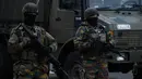 Tentara Belgia melakukan penjagaan di dekat Bandara Zaventem, Brussels, Belgia, (23/3). Sehari setelah serangan teror yang melanda kota Belgia, Petugas keamanan berjaga ketat dsekitaran lokasi. (JOHN THYS / AFP)