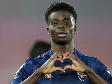 Bukayo Saka merupakan pemain Arsenal yang saat ini memiliki nilai banderol sebesar 65 juta euro. Dirinya tercatat mengalami kenaikan dari awal tahun 2021 sebanyak 40 juta euro. (Foto: AFP/Pool/Frank Augstein)