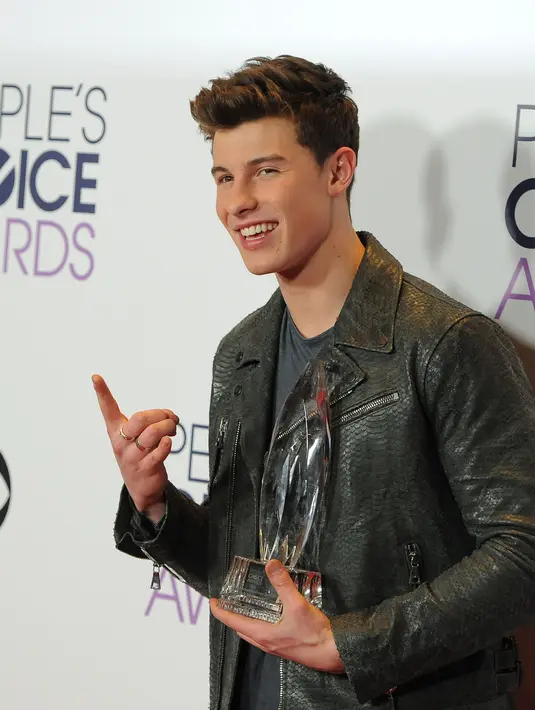 Shawn mengungkapkan dirinya sangat menikmati status lajangnya ketimbang dirinya harus menyandang status pacaran dengan wanita. (AFP/Bintang.com)