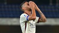 AS Roma dilanda badai COVID-19 setelah tiga pemain kembali terkonfirmasi positif yakni Federico Fazio, Lorenzo Pellegrini, dan Davide Santon. (AFP/Alberto Pizzoli)
