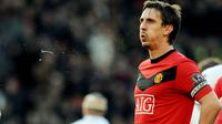Gary Neville - Salah satu bek terbaik Manchester United sepanjang masa ini merupakan sosok yang paling keras menolak Liga Super Eropa. Pandit sepak bola Inggris itu bahkan meminta MU didegradasi dari Liga Inggris. (AFP/Paul Ellis)