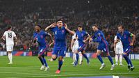 Timnas Inggris meraih kemenangan 5-0 atas Albania pada laga kesembilan Grup I kualifikasi Piala Dunia 2022 zona Eropa di Stadion Wembley, Sabtu (13/11/2021) dini hari WIB. (AFP/Glyn Kirk)