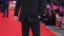 Brendan Fraser berpose untuk fotografer saat tiba untuk pemutaran perdana film 'The Whale' selama Festival Film London 2022 di London, Selasa, 11 Oktober 2022. Aktor 53 tahun itu yang telah mendapatkan pujian kritis untuk penampilannya dalam drama psikologis, tampil necis dengan setelan jas hitam. (Photo by Vianney Le Caer/Invision/AP)