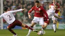 Gol pertama di Liga Champions. Cristiano Ronaldo mencetak gol pertamanya bersama Manchester United di Liga Champions saat menghadapi AS Roma pada leg kedua babak perempatfinal, 11 April 2007. Cristiano Ronaldo mencetak dua gol yang membawa Setan Merah menang 7-1. (Foto: AFP/Filippo Monteforte)