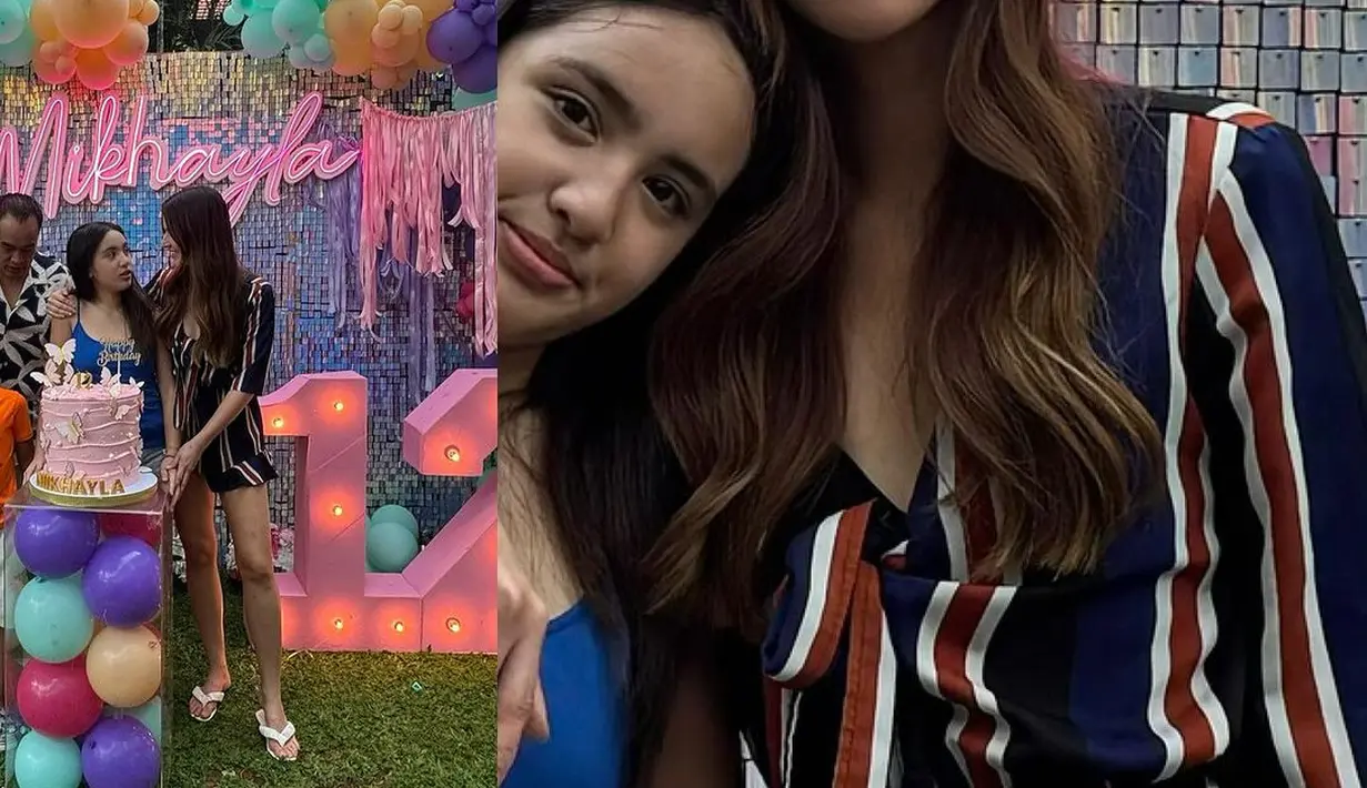 Nia Ramadhani tampil simple dengan stripe jumpsuit navy oranye yang effortless [@ramadhaniabakrie]