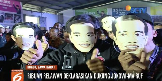 Ribuan Relawan Bertopeng Dukung Jokowi-Ma'ruf Amin
