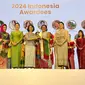 Rinawati Prihatiningsih, yang lebih dikenal sebagai Rina Zoet, menerima penghargaan prestisius AWEN Award di Kamboja.(Tim News).