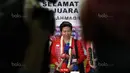 Liliyana Natsir sibuk melayani pertanyaan Wartawan saat tiba di Bandara Soekarno-Hatta, Cengkareng (29/8/2017). Tontowi/Liliyana meraih medali emas pada kejuaraan dunia di Glasgow. (Bola.com/Nicklas Hanoatubun)
