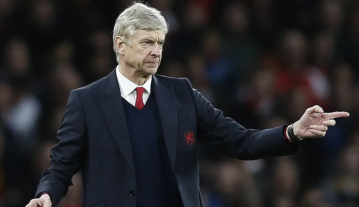 Arsene Wenger memulai karir sebagai pemain pada klub divisi tiga Prancis Mutzig dan klub Jerman Starsbourg, Wenger terbilang sukses saat melatih Arsenal dan menjuarai FA Cup dan Liga Inggris 1998. (AFP/Adrian Dennis)