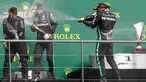 Pembalap Mercedes, Lewis Hamilton, melakukan selebrasi usai menjuarai balapan F1 GP Belgia di Sirkuit Spa-Francorchamps, Minggu (30/8/2020). Lewis Hamilton finis pertama dengan catatan waktu 1 jam 24 menit 8,761 detik. (Francois Lenoir/Pool Photo via AP)