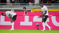 Pemain AC Milan Alphadjo Cisse merayakan gol dalam laga Serie A antara Torino vs Milan di Turin, Italia, Minggu, 23 Agustus 2026. (Marco Alpozzi/LaPresse via AP)