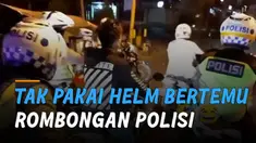 Nasib apes dialami oleh seorang pemuda saat kendarai motor tidak pakai helm dan berhenti di lampu merah bertemu dengan rombongan polisi.