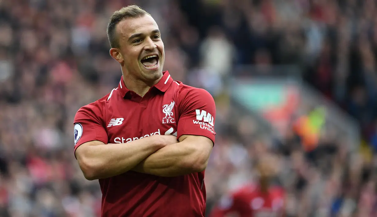 Xherdan Shaqiri berhasil mendapatkan gelar Liga Champions bersama Liverpool pada tahun 2019. Shaqiri sebelumnya juga pernah menyabet gelar tersebut saat berseragam Bayern Munchen di tahun 2013. (AFP/Paul Ellis)