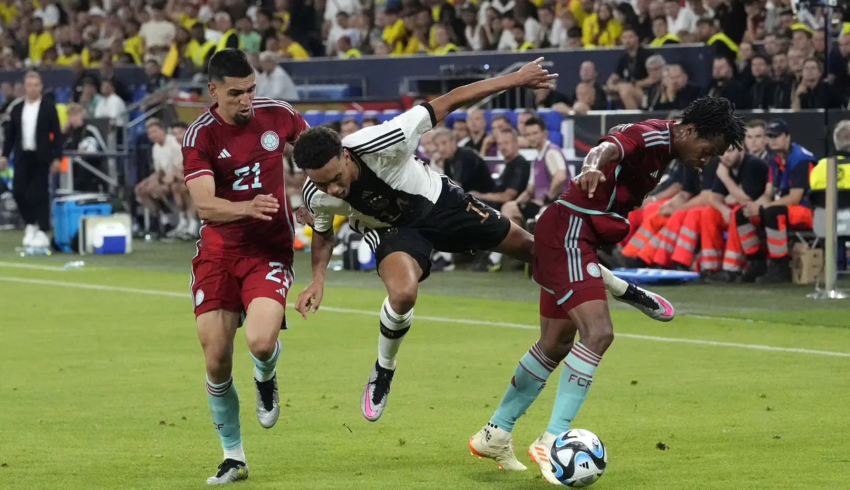 Di babak kedua, Kolombia sukses membuka keunggulan pada menit ke-54 lewat gol Diaz dan Cuadrado di menit 82.  (AP Photo/Martin Meissner)