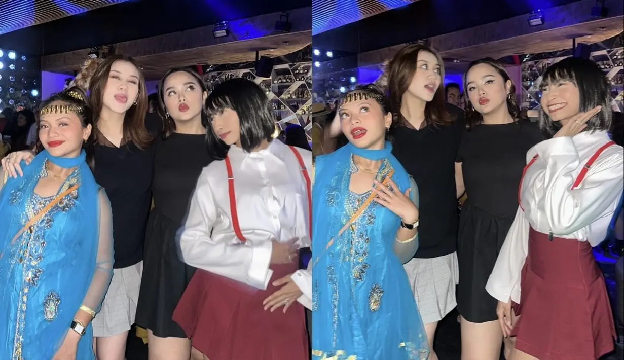 Amel Carla hadir dengan tampilan Jinny oh Jinny dengan baju serba biru serta tatanan rambut tinggi khas karakter tersebut. [@septiningtyas]