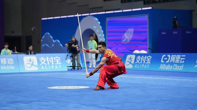 Foto: Aksi Harris Horatius di Cabang Wushu Sumbang Emas Ketiga untuk Kontingen Indonesia di Asian Games 2022